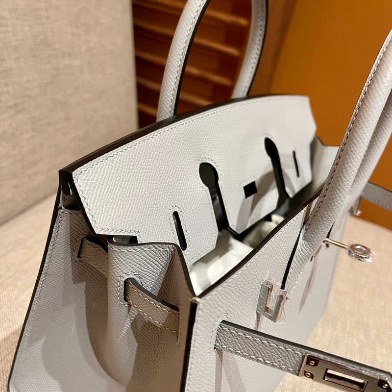 Side view of considered structured handbag