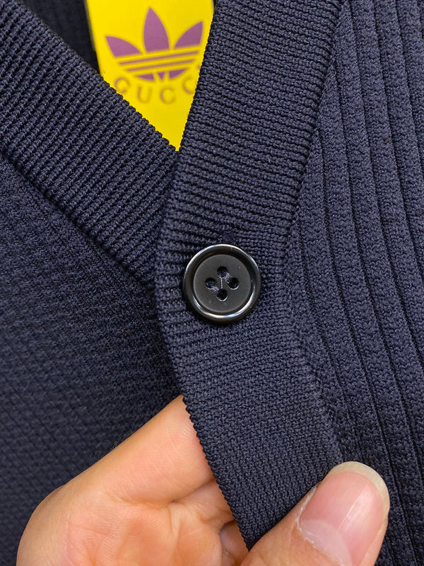 Front view of Gucci luxury clothing with label-forward styling