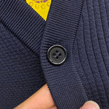Front view of Gucci luxury clothing with label-forward styling