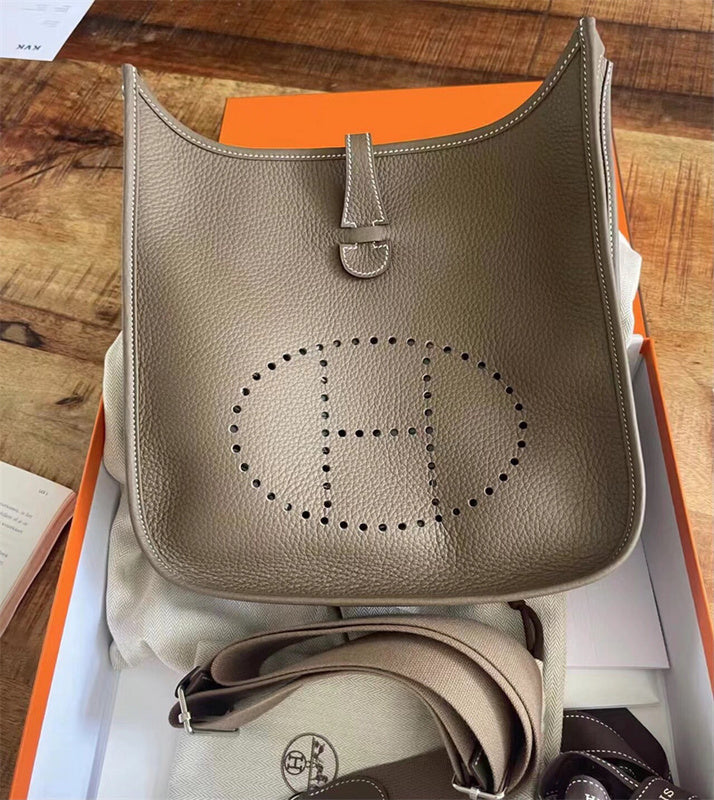  structured top-handle bag styled with outfit