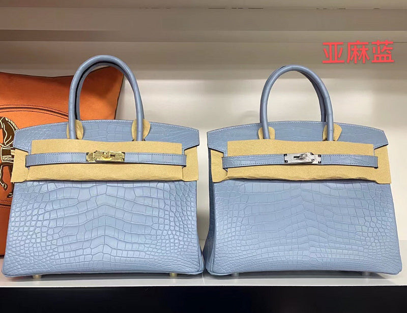 Side view of poised structured handbag