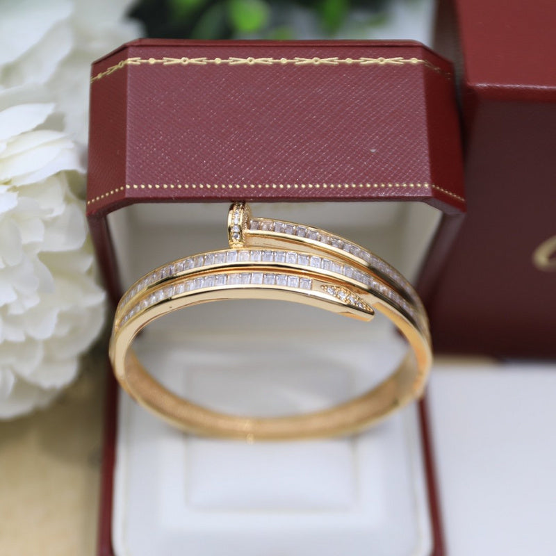 Side view of Cartier unisex jewelry piece