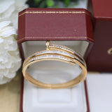 Side view of Cartier unisex jewelry piece