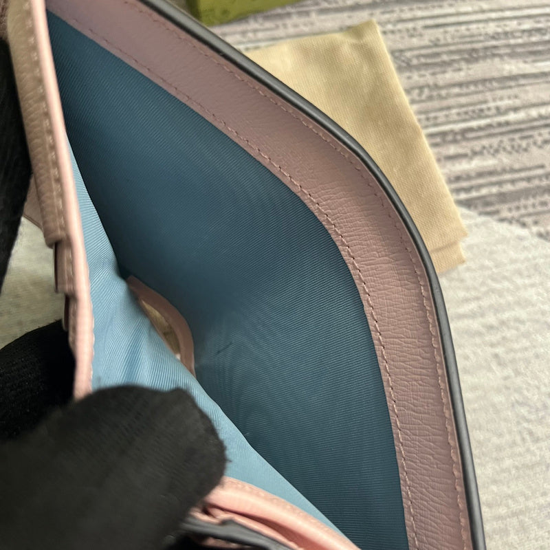 Close-up detail of signature classic women's handbag – women's luxury handbag