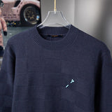 Side profile of Louis Vuitton luxury clothing with tailored silhouette