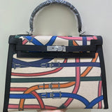 Side view of contemporary structured handbag