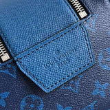 Back view of sleek structured women's handbag – women's luxury accessory