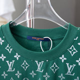 Close-up detail shot of Louis Vuitton cotton t-shirt with signature branding