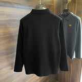 Side profile of Louis Vuitton luxury clothing with label-forward styling