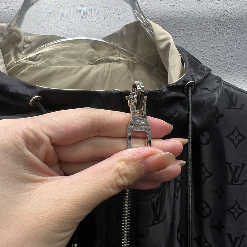 Flat lay presentation of Louis Vuitton luxury clothing with runway-inspired design