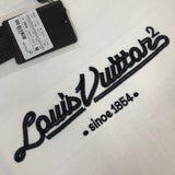 Flat lay presentation of Louis Vuitton cotton t-shirt with runway-inspired design
