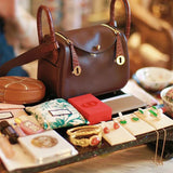  sleek satchel detail view showing craftsmanship 8