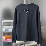 Side profile of Louis Vuitton luxury clothing with relaxed-fit cut