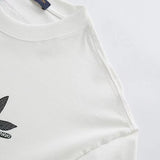 Flat lay presentation of Louis Vuitton cotton t-shirt with monogram-inspired silhouette