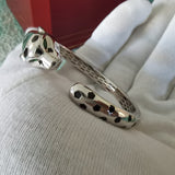 Front view of Cartier unisex jewelry piece