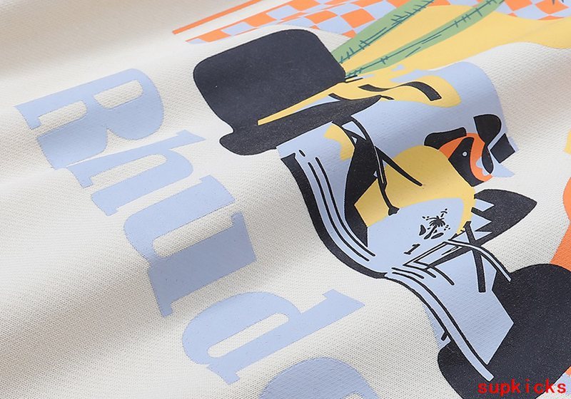 Close-up detail shot of Rhude luxury clothing with signature branding