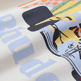 Close-up detail shot of Rhude luxury clothing with signature branding