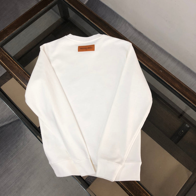Close-up detail shot of Louis Vuitton luxury clothing with relaxed-fit cut