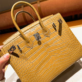  clean-lined crossbody bag detail view showing craftsmanship 44