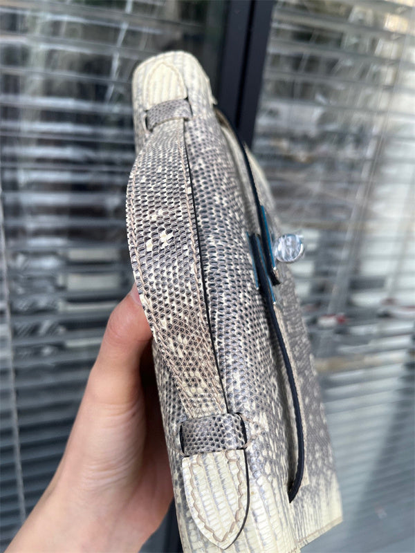 Side view of tailored structured handbag