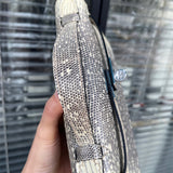 Side view of tailored structured handbag