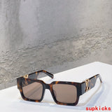 Close-up detail view of Louis Vuitton unisex sunglasses