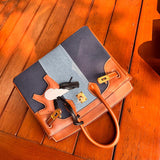 Sculpted handbag styled for everyday wear