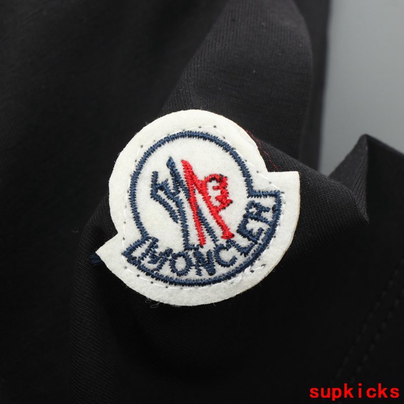 Side profile of Moncler luxury clothing with tailored silhouette