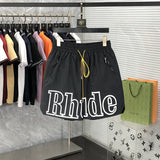 Front view of Rhude luxury clothing with logo-detail design