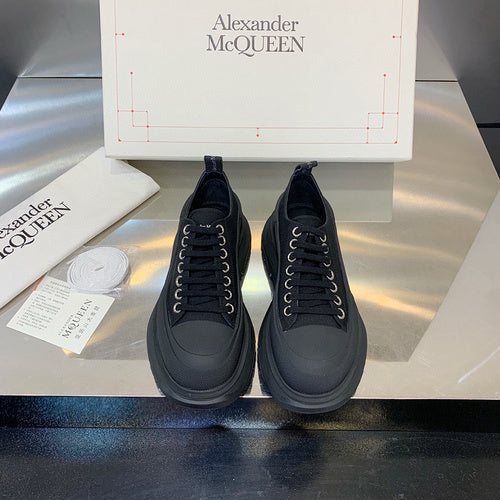 Alexander McQueen Grey Combat Boots - Close-Up Texture View