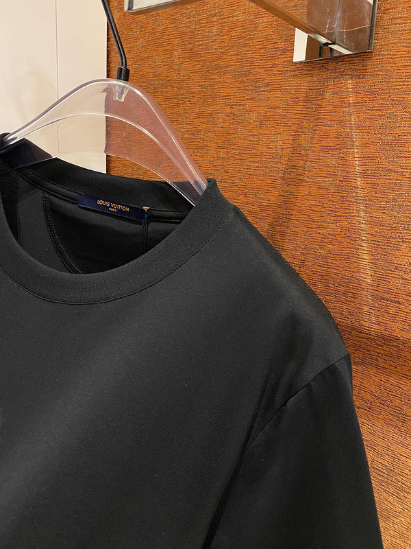 Flat lay presentation of Louis Vuitton cotton t-shirt with tailored silhouette