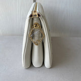 Close-up detail of structured premium women's handbag – women's designer-style accessory