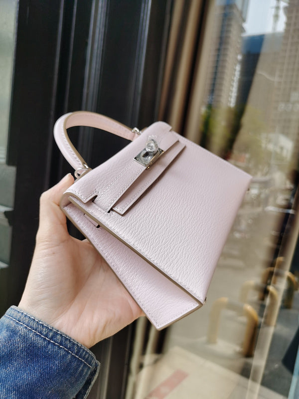 Side view of poised structured handbag