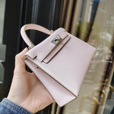 Side view of poised structured handbag