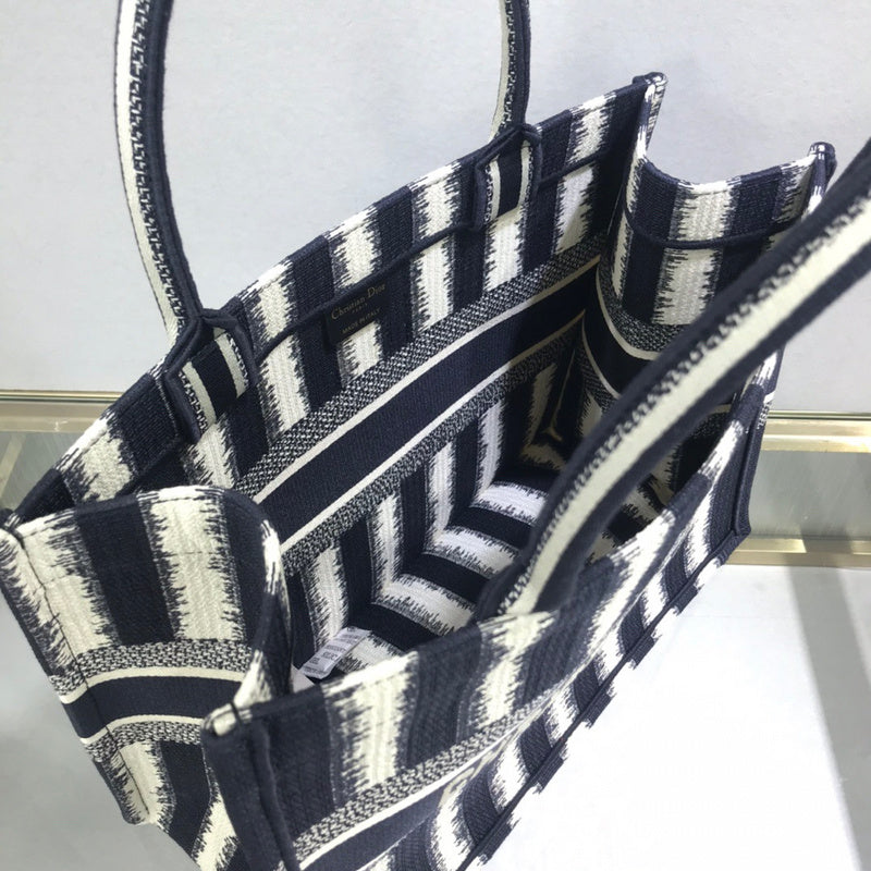 Top view of modern statement women's handbag – women's luxury accessory