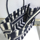 Top view of modern statement women's handbag – women's luxury accessory