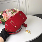 Handle and strap detail of refined statement women's handbag – women's luxury handbag