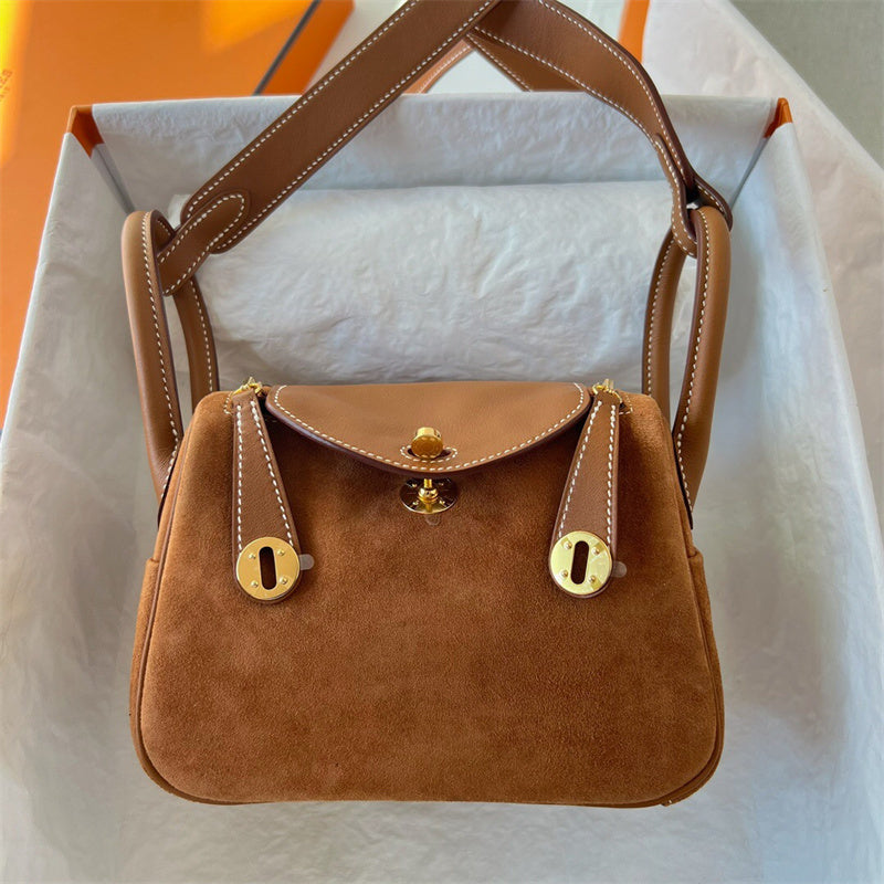 Side view of poised structured handbag