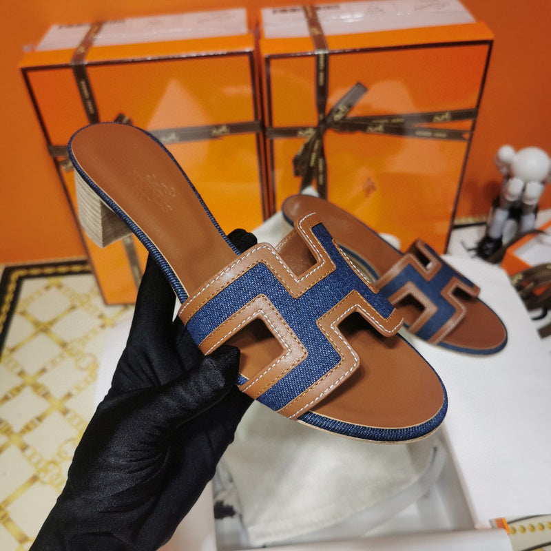 Hermes sandals Style 053 - front view, iconic logo design