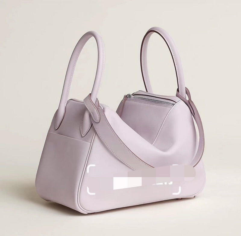 Side view of classic structured handbag