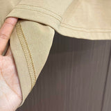 Side profile of Louis Vuitton cotton t-shirt with label-forward styling