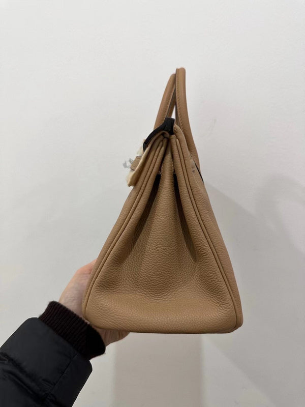 Side view of modern structured handbag