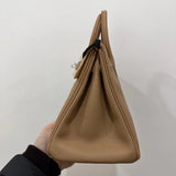 Side view of modern structured handbag