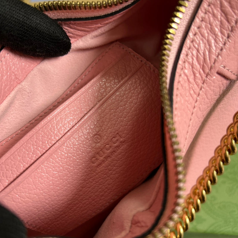 Side profile of statement signature women's handbag – women's luxury accessory