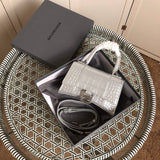Front view of modern classic women's handbag – women's luxury accessory