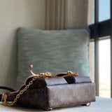  clean-lined crossbody bag detail view showing craftsmanship