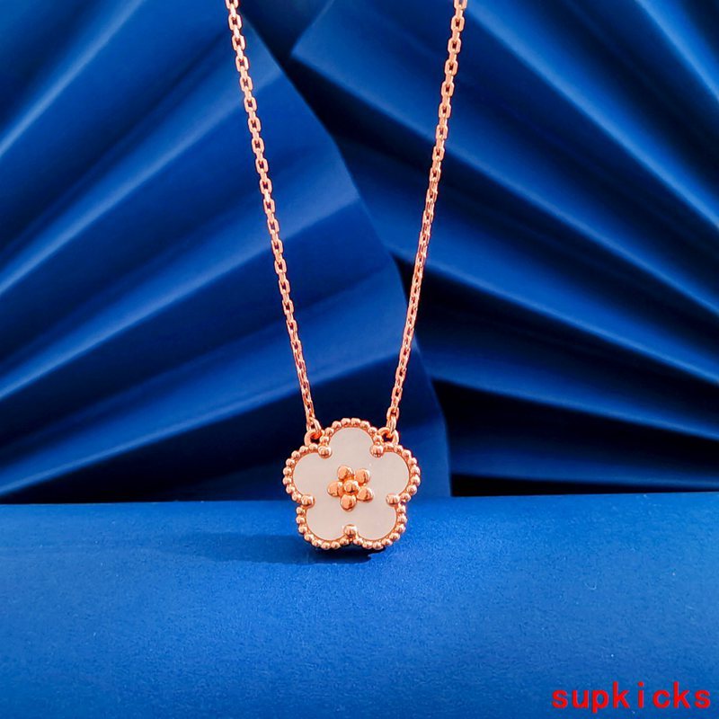 Lifestyle view of Van Cleef & Arpels unisex jewelry piece