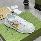Gucci Designer sneakers in bold contrast signature lace-up style front view