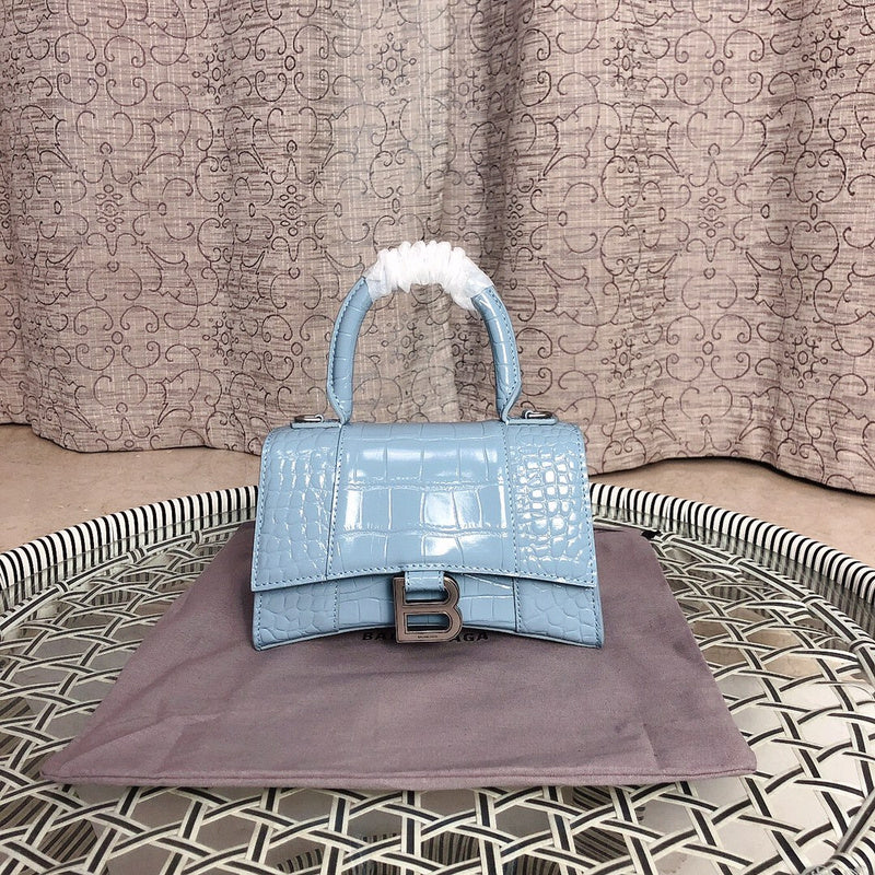 Close-up detail of structured polished women's handbag – women's designer-style accessory