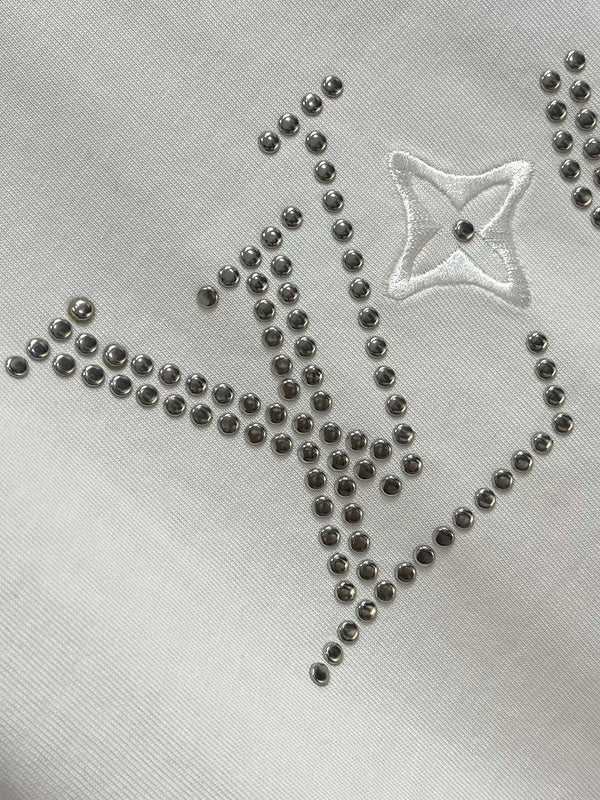 Flat lay presentation of Louis Vuitton cotton t-shirt with logo-detail design